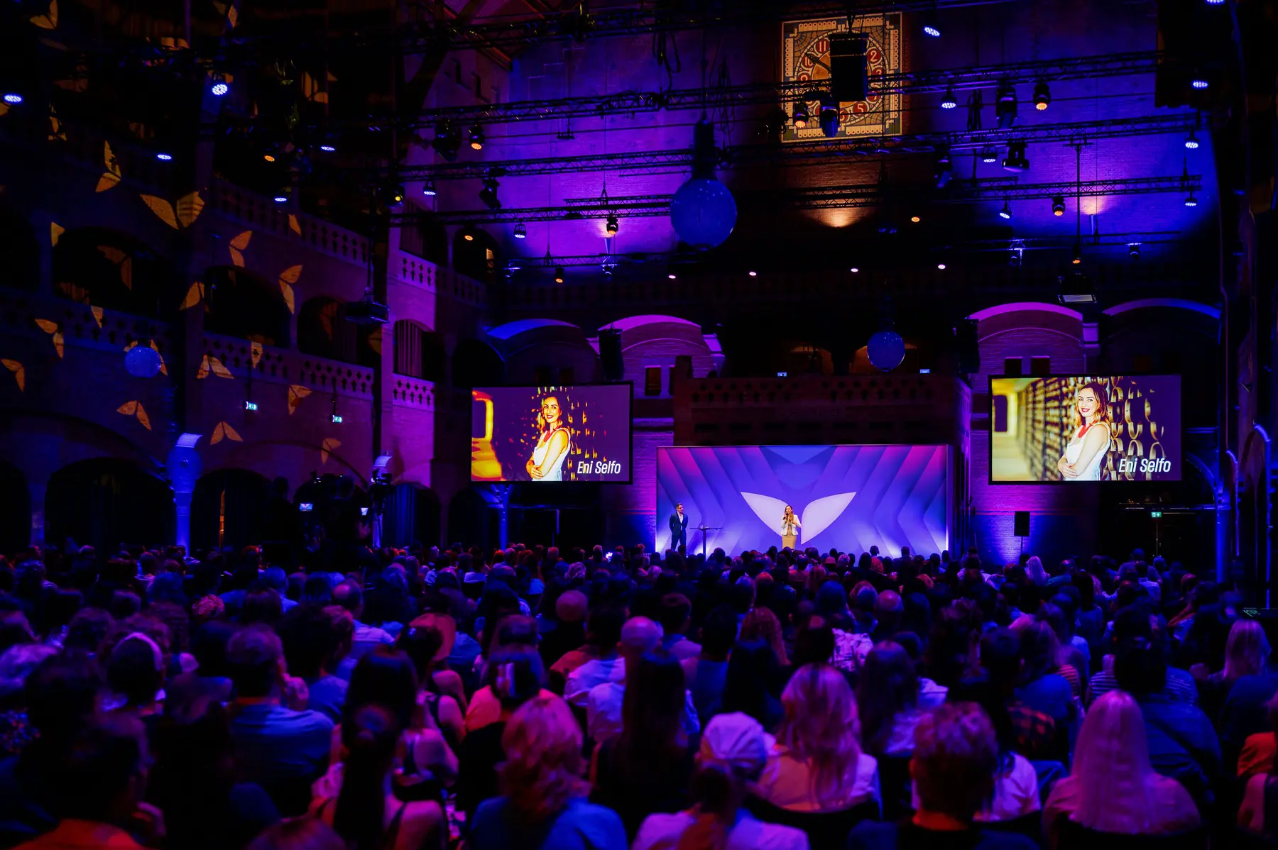 The main hall at Mindvalley U, with stage screens