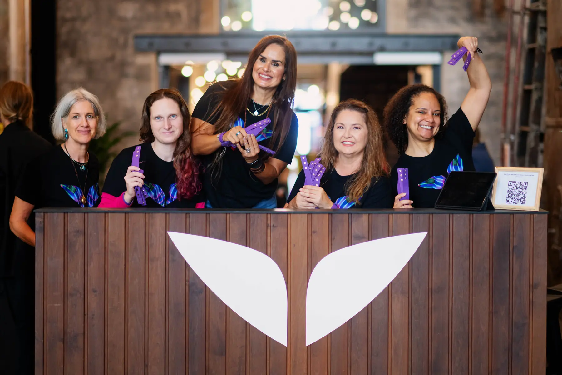 Team at the Mindvalley registration desk