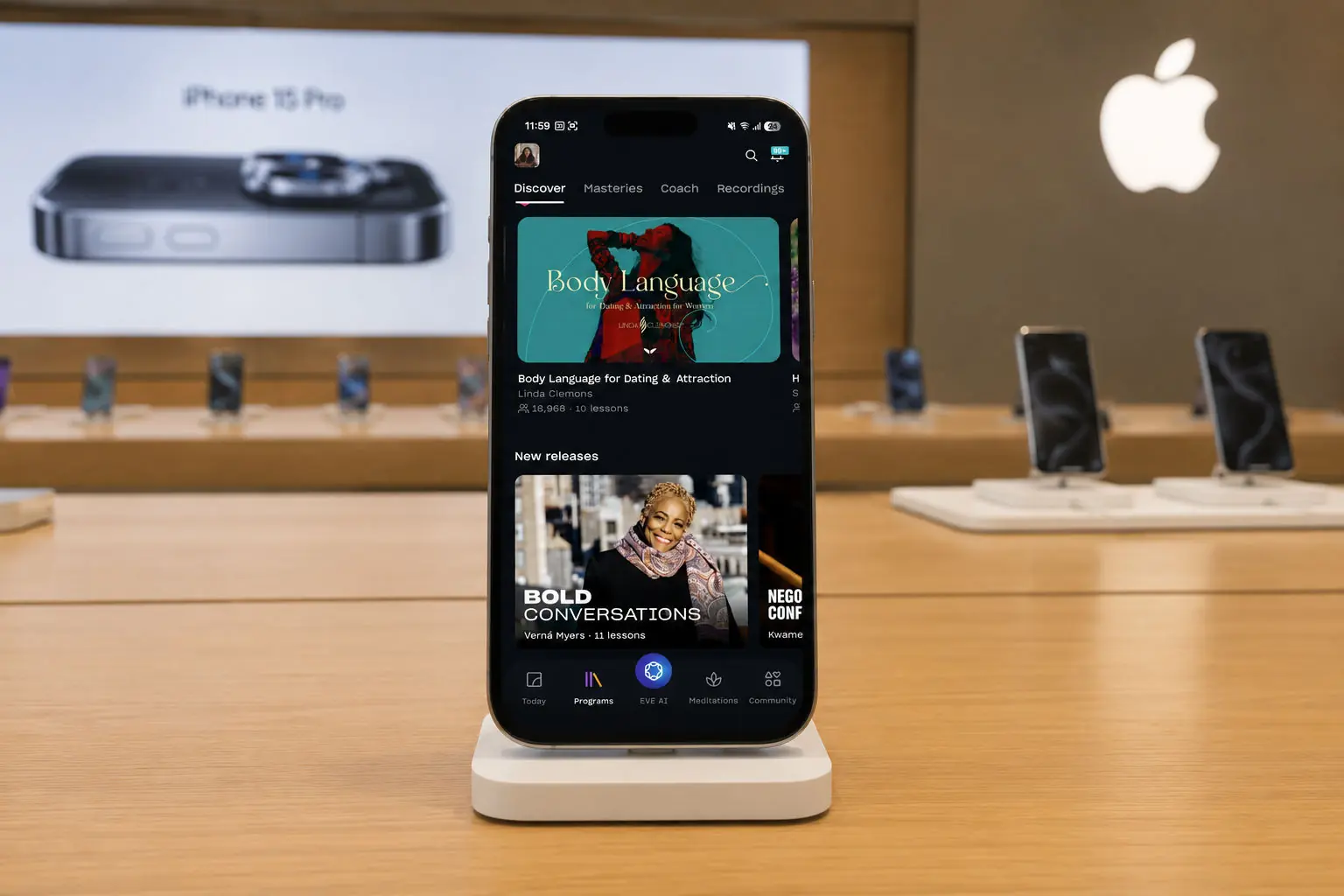 The Mindvalley app on an iPhone demo stand in an Apple Store